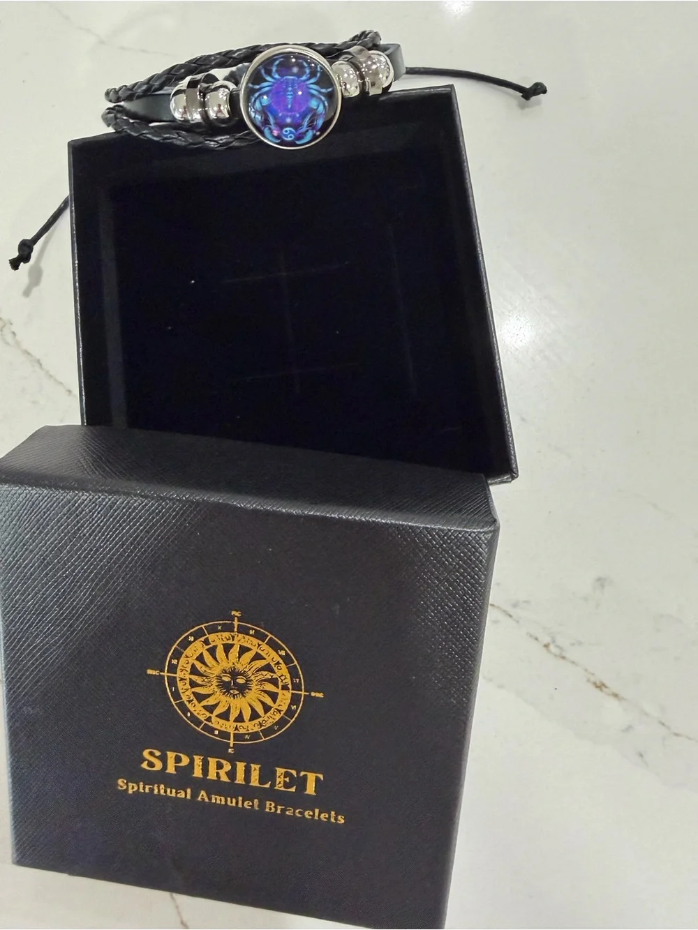 Spirilet Zodiac Black Braided Leather Bracelet with Blue Iridescent Cabochon